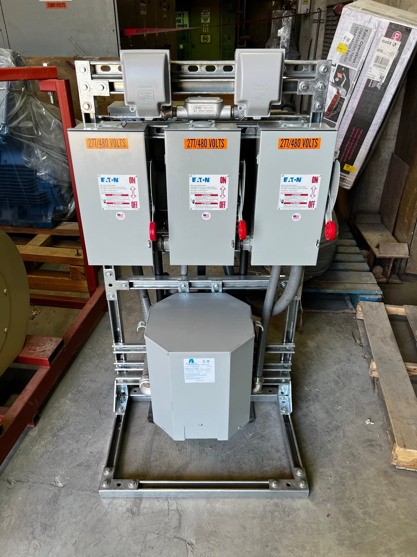 Custom skid-mounted portable power distribution rack with safety switches and transformer