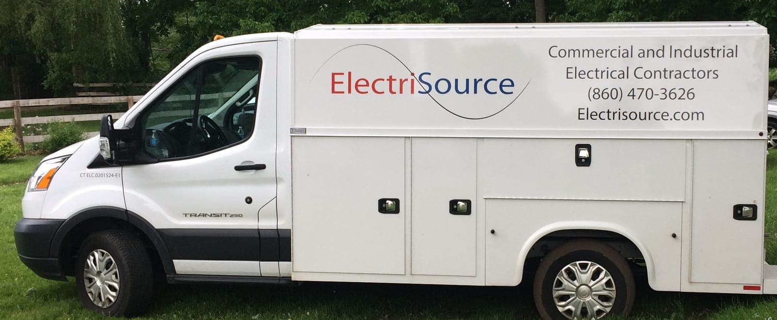 Electrisource service van lettered with the company logo, phone number, and website